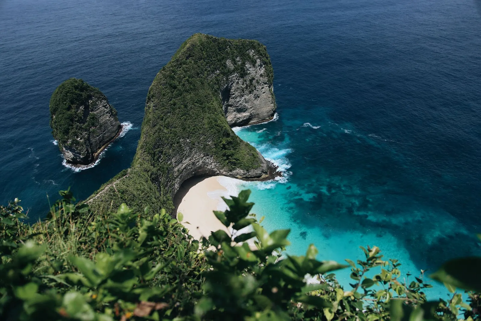 The cliffs of Nusa Penida dropping into turquoise water